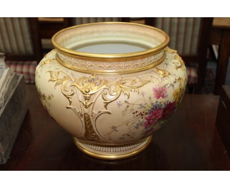 A LARGE BLUSH IVORY ROYAL WORCESTER JARDINIERE decorated with floral sprays and gilt acanthus leaf motifs, purple stamp to th