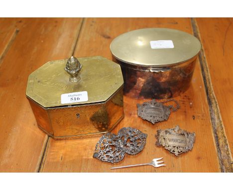 A BRASS OCTAGONAL TEA CADDY, 15cm wide together with a silver plated oval tea caddy, a white metal belt buckle, two spirit la