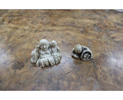 A LATE 19TH CENTURY JAPANESE IVORY NETSUKE of a seated figure with a basket of peaches, indistinctly signed to the underside,