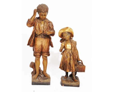 A LATE 19TH CENTURY GOLDSCHEIDER POTTERY AND PAINTED FIGURE of a boy in bare feet standing over a broken pot with stamps to t