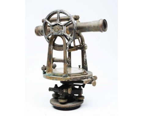 AN OLD BRASS THEODOLITE, the central compass signed Keuffel & Esser Co., New York and numbered 90761, 36cm high (AF)