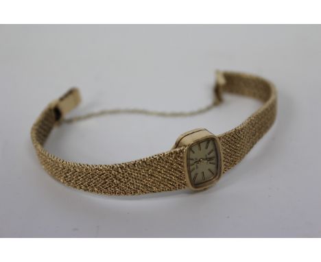 A LADIES ROTARY 9 CARAT GOLD WRISTWATCH, the dial baton markings inscribed 21 jewels