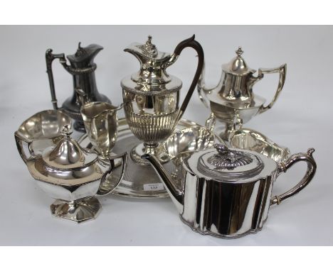 A SMALL QUANTITY OF SILVER PLATE to include a teapot, a coffee pot, two claret jugs etc.