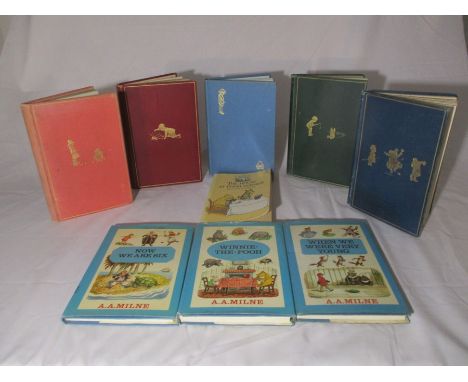 A collection of nine A.A. Milne books including first editions of "Now We Are Six" &amp; "The House At Pooh Corner". Also inc