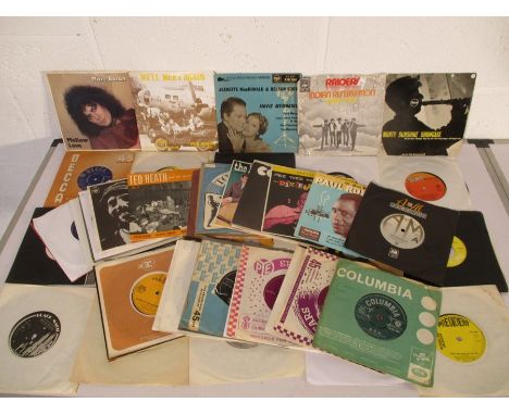 A collection of 7" vinyl records including Marc Bolan, The Beatles, The Bee Gees, Cliff Richard, The Rolling Stones, The Bach