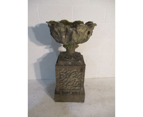 A concrete garden urn on plinth - overall height 94cm
