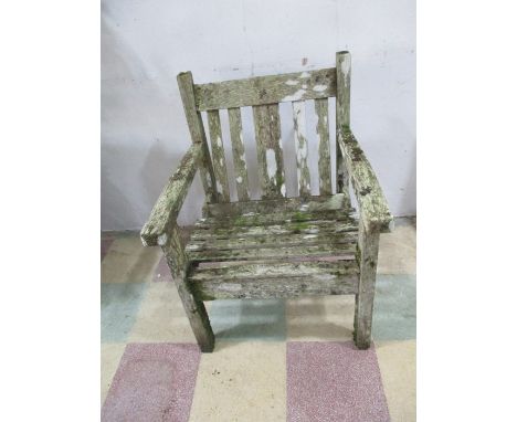 A single wooden garden seat