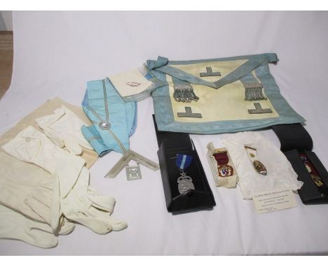 A collection of Masonic regalia including a hallmarked silver jewel for Colvin Lodge No 5374 43rd. W.M. along with three othe