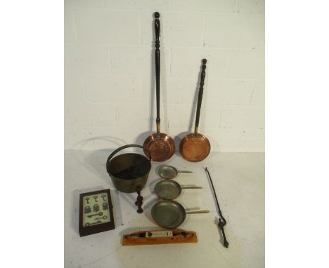 A collection of copperware along with a key cabinet, thermometer, egg timers etc