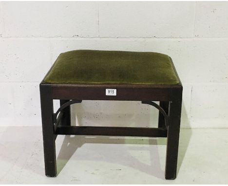 A Georgian mahogany upholstered stool 