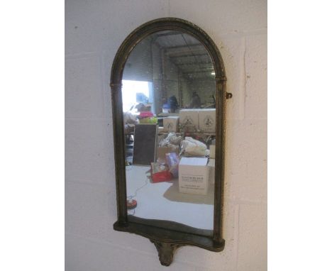 A gilt hanging wall mirror with shelf