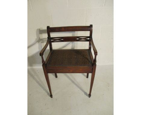 An Edwardian inlaid piano stool