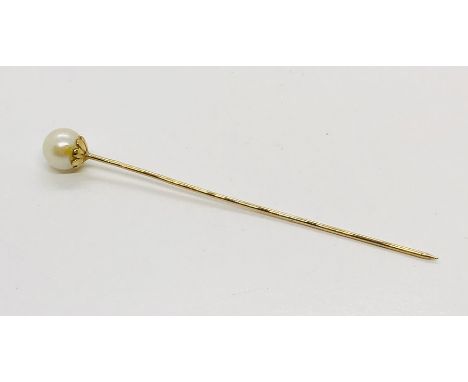 A continental gold (probably 14ct) tie pin set with a pearl