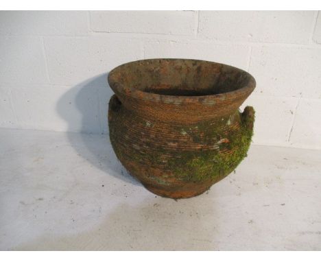A terracotta garden pot with two handles - height 40cm, diameter 47cm 