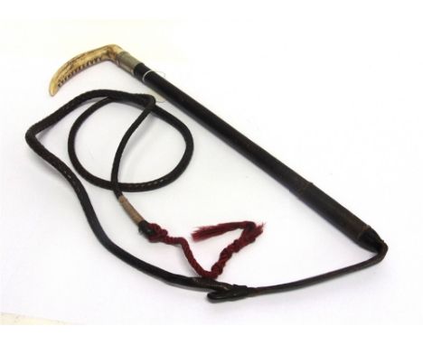 A GENT'S RIDING WHIP by 'Swaine', with antler grip, plated collar and plaited leather shaft and leash