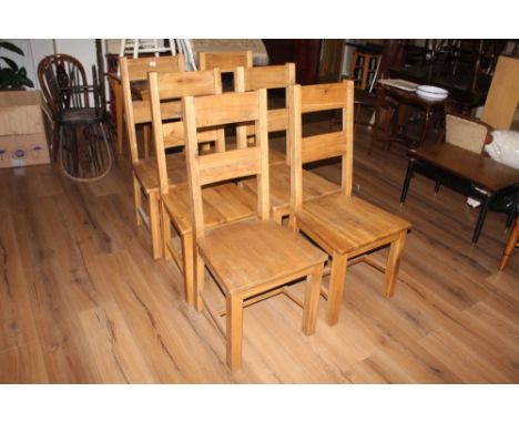 A group of six heavy modern oak dining chair, of ladder back form, height to seat 46 cm and the total height to the top of th