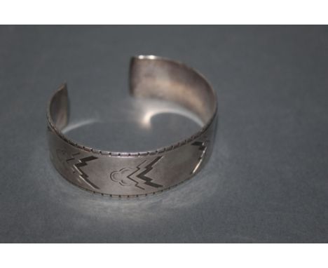 A vintage George Jensen silver bangle of Art Deco style, design number 38, marked sterling Denmark and with George Jensen sta