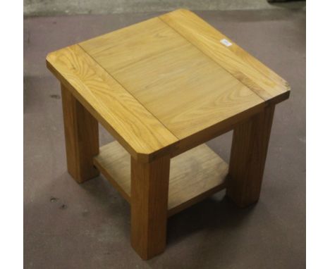 A small modern oak coffee table, with under shelf, dimensions 45 cm x 50 cm x 50 cm.  CONDITION REPORT: Generally good condit