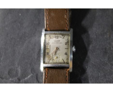 A 1960's gentleman's Tissot antimagnetique stainless steel cased wrist watch, the silvered dial with Arabic and hour batons a