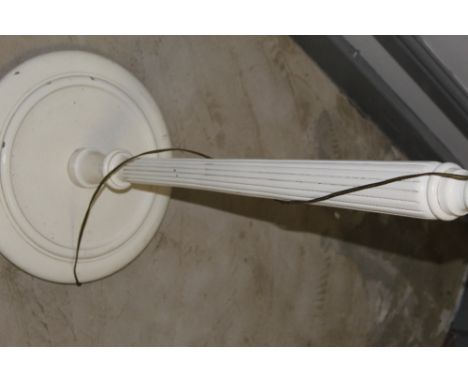 A white painted wood standard lamp, with shade. CONDITION REPORT: Scuffing and wear throughout.