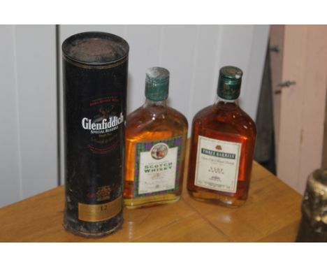 A 35 cl bottle of Glenfiddich special reserve single malt Scotch Whiskey with gift tin. (Rusted). A 35 cl bottle of Scotch Wh