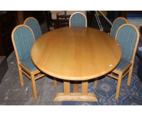 A large modern light wood oval dining table, with refectory style base, 85 cm x 188 cm x 128 cm, together with a set of six m