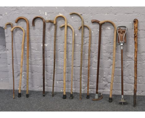 A bundle of walking sticks, along with a shooting stick.