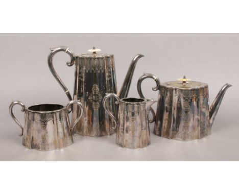 An Edwardian silver plated four part tea service of scalloped lozenge form.