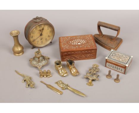 A box of collectables including mother of pearl and bone inlaid hardwood trinket boxes, vintage alarm clock, brass ornaments 