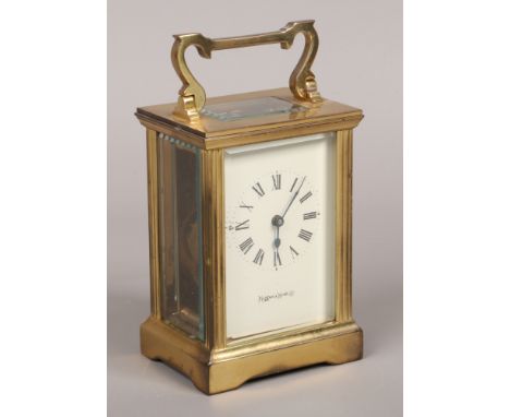 A brass carriage clock by Mappin &amp; Webb Ltd.