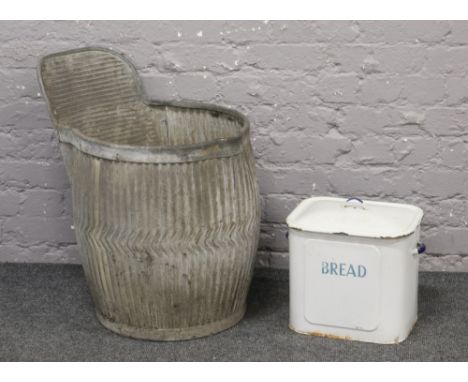 A vintage galvanised rub- a- tub wash tub, along with a white enamel bread bin.