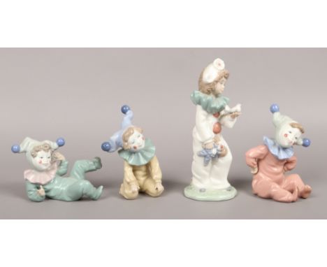 Four Nao cermaic figures of young clowns.