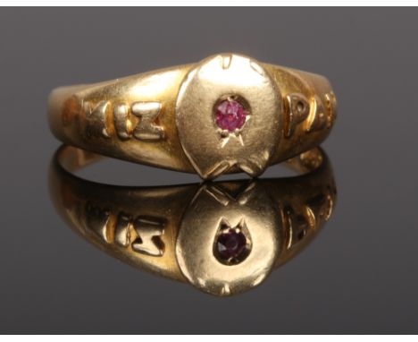 An 18ct gold Mizpah ring set with a single ruby in a horse shoe. Assayed Birmingham 1911. Size M.Condition report intended as