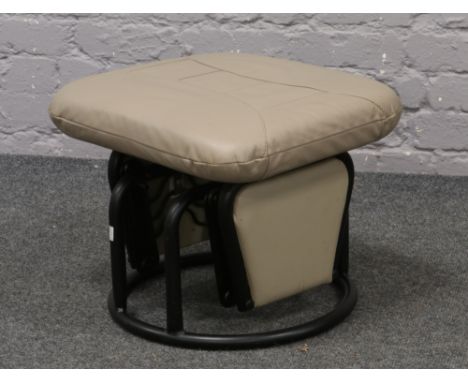 A South American leather covered rocking stool by Relax - R Corporation made in Canada.