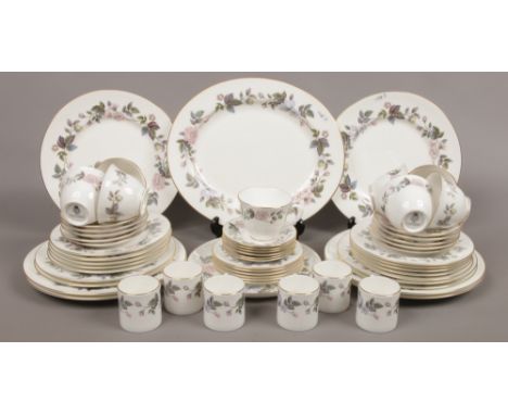 A Royal Worcester 59 piece dinner service in the June Garland design.