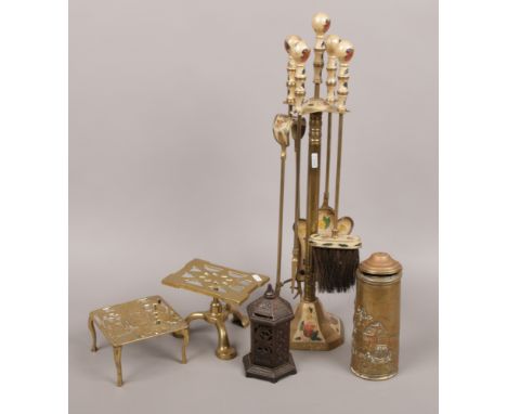 A quantity of metalwares to include brass and enamel fireside companion set, pierced iron money bank, Kastal van Westmal jug 