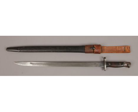 A 1907 World War One British bayonet in leather scabbard blade stamped Sanders.