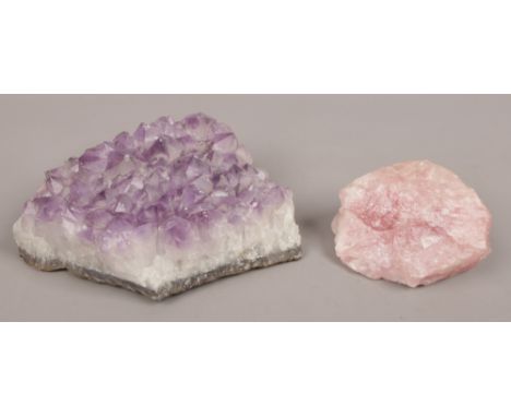 Two geological specimens rose quartz and amethyst.