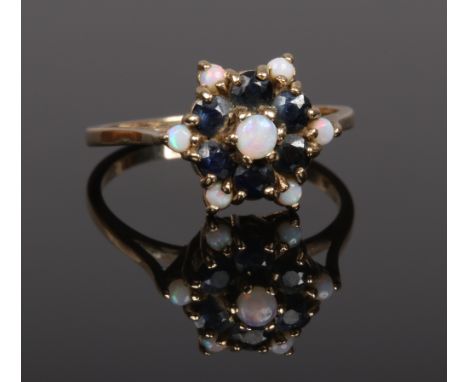 A 9ct gold opal and sapphire cluster ring, size Q.