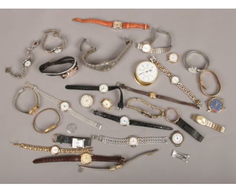 A box of ladies and gents wristwatches to include quartz and manual examples.