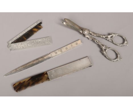 A collection of miscellaneous silver and white metal items to include silver and tortoise shell flick comb, silver letter ope