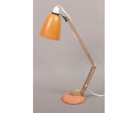 A 1970s anglepoise reading lamp.