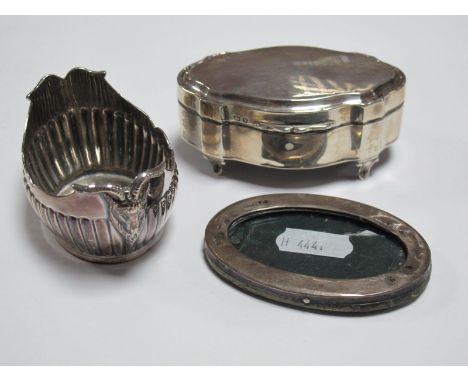 A Decorative Hallmarked Silver Trinket Box, with hinged lid, raised on four legs; together with a Walker & Hall plated salt a