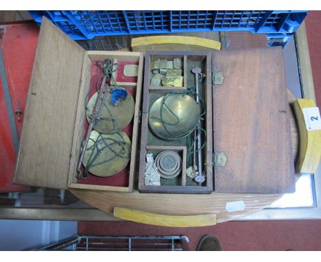 Two XIX Century Sets of Brass Panned Balance Scales, with weights, and oval tray.