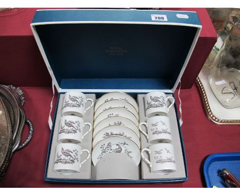 Royal Worcester Coffee Cans and Saucers, (boxed) with a white ground decorated with birds. 