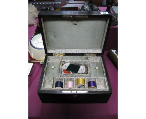 XIX Century Coromandel Sewing Box, the top decorated with Mother of Pearl inlay in the form of foliage and cherub. 