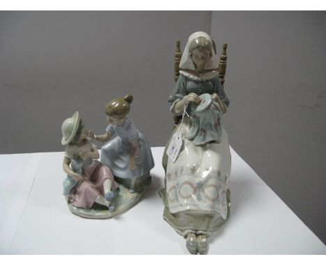 Lladro Figure, of a lady sewing; together with a figure group of two children playing. (Boxed) (2)