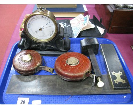 A Victorian Desk Barometer, an ebony and brass marker gauge, similar set square and two leather case tape measures:- One Tray