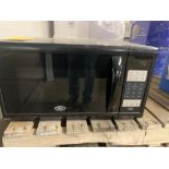 Oster Microwave, 1100 watts (Required Loading Fee: $10.00) NO HAND CARRY (Price Is For Simple