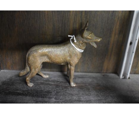 A bronze German shepherd, 11.5cm high. 